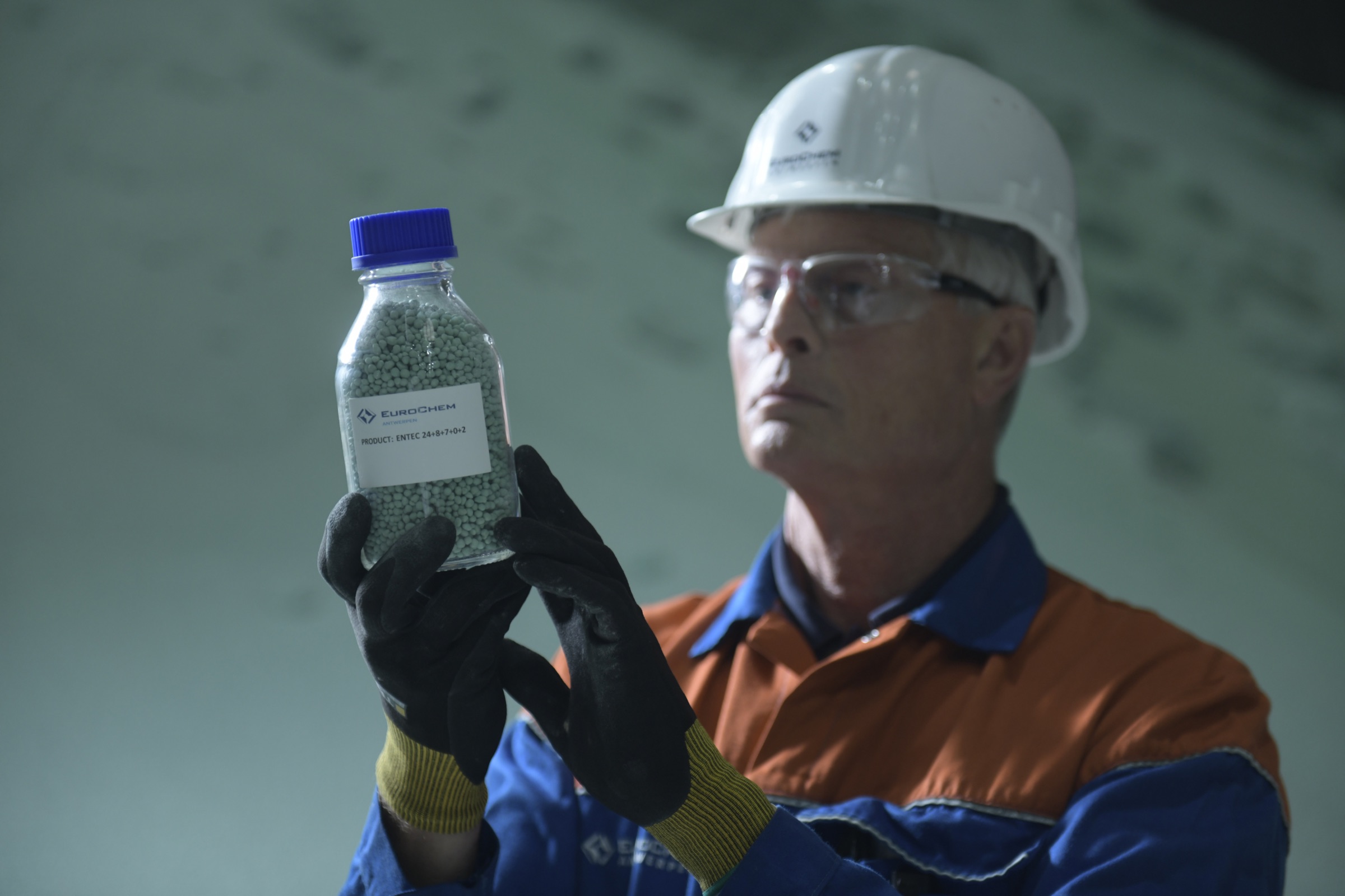EuroChem specialist inspecting fertilizer